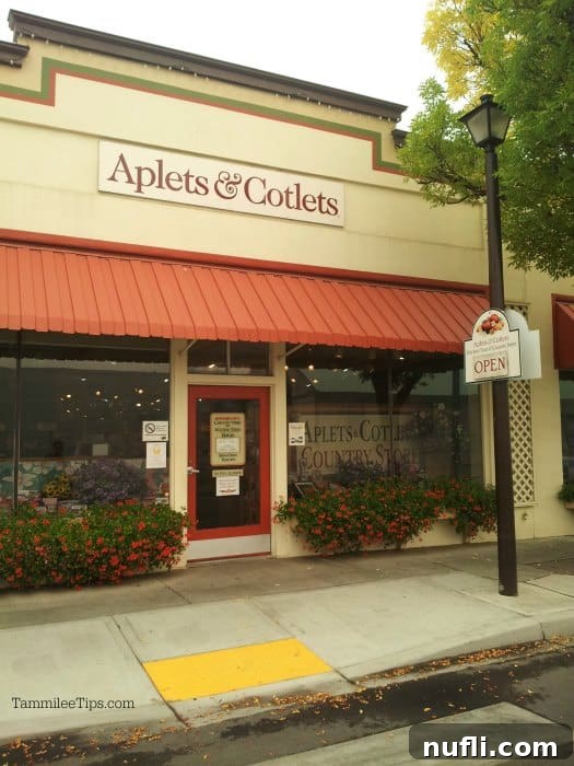 Aplets & Cotlets sign over the entrance to the bakery and store