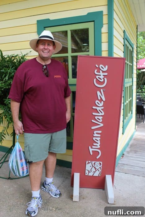 John standing next to the Juan Valdez Cafe