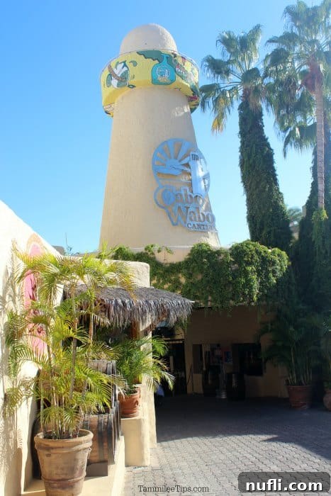 Cabo Wabo Cantina: Cabo's Legendary Party Spot 6 An exterior shot of Cabo Wabo Cantina featuring a distinctive lighthouse structure, adding to its unique charm.