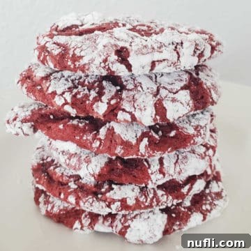 stack of Red Velvet Cake Mix Cookies on a white plate