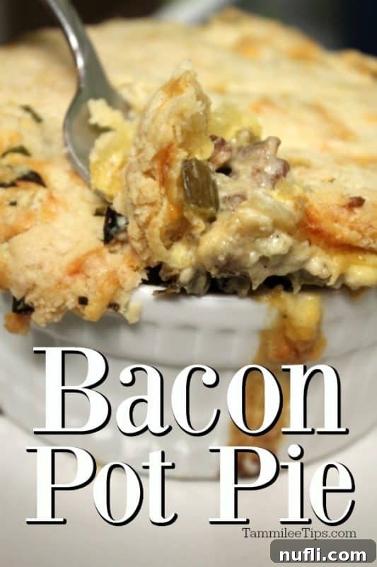 Golden brown bacon pot pie with a fork showing the creamy filling and crispy bacon bits, served in a white ramekin.
