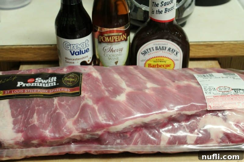 ribs next to Worcestshire sauce, sherry cooking wine, sweet baby rays bbq sauce. 