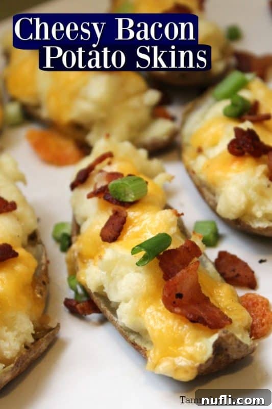 Cheesy Bacon Potato Skins text over a white platter with potato skins topped in cheese, bacon and green onion