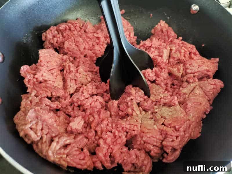 Mix in Chop in Ground Beef in a Skillet