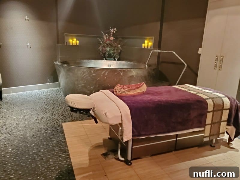 massage table near a soaking tub