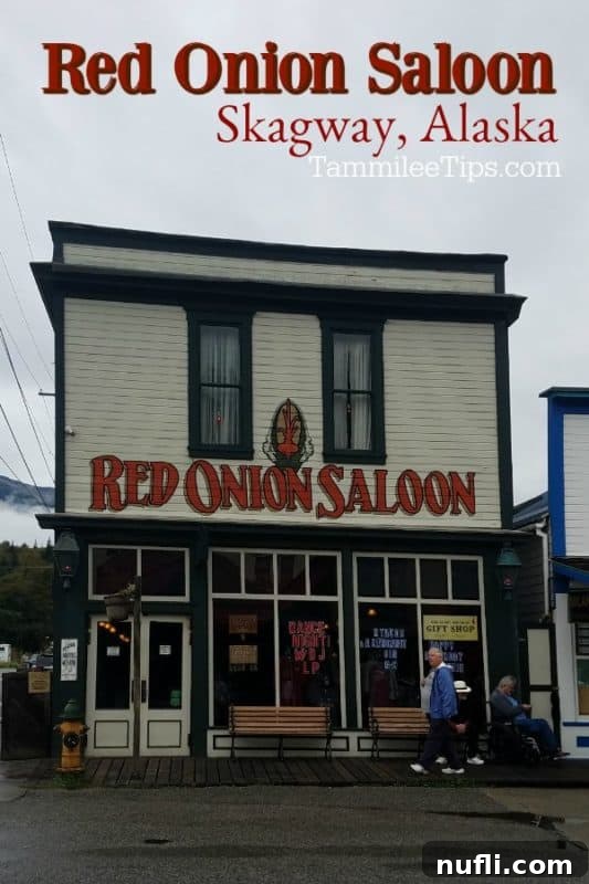 The historic exterior of the Red Onion Saloon in Skagway, Alaska, an iconic Gold Rush landmark.