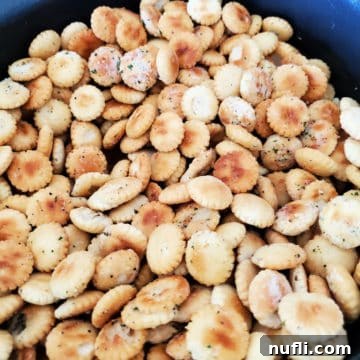 Easy Crock Pot Ranch Oyster Crackers 4 Ranch oyster crackers in a slow cooker