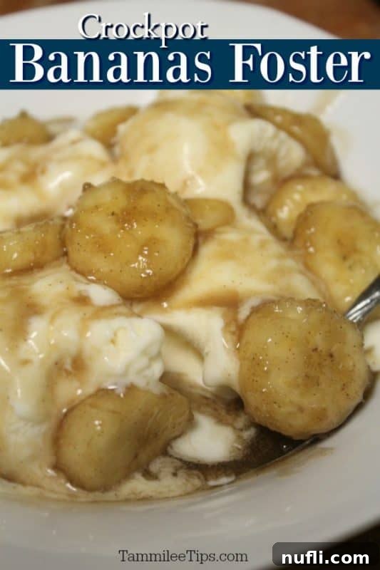 Effortless Slow Cooker Bananas Foster Dessert 2 Crockpot Bananas Foster served in a white bowl with vanilla ice cream, garnished with fresh banana slices.