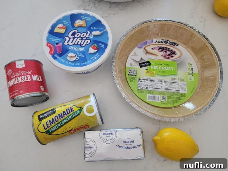 Sunshine Lemon Icebox Pie 3 sweetened condensed milk, lemonade concentrate, cool whip, graham cracker crust, cream cheese, and lemons