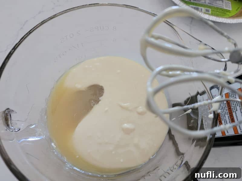 Sunshine Lemon Icebox Pie 5 no bake lemonade pie mix in a glass batter bowl