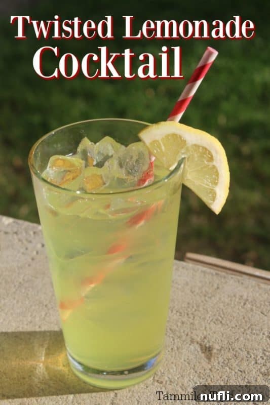 Perfecting the Iconic Zesty Lemonade Twist 2 Twisted Lemonade Cocktail text over a glass with lemonade, lemon wedge and a paper straw
