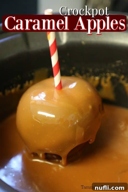 Crockpot Caramel Apple over an apple coming out of melted caramel in a slow cooker, symbolizing autumn dessert