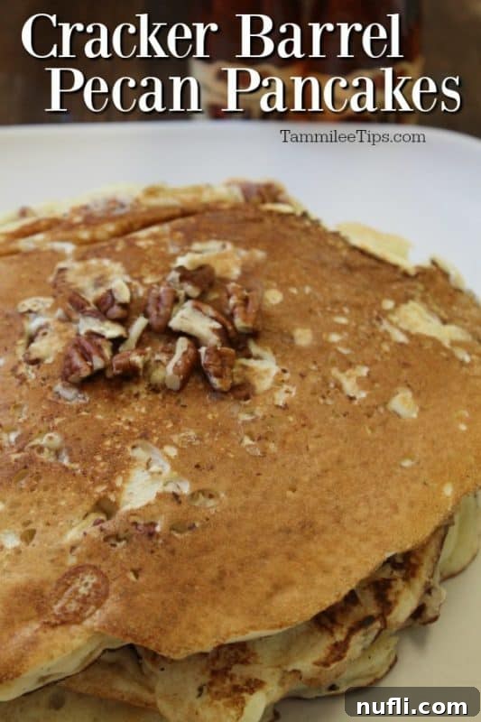 Cracker Barrel Pecan Pancakes over a stack of pancakes on a white plate