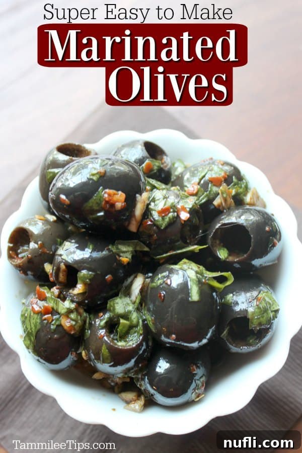 Super easy to make Marinated Olives text over a white bowl with black olives and seasoning