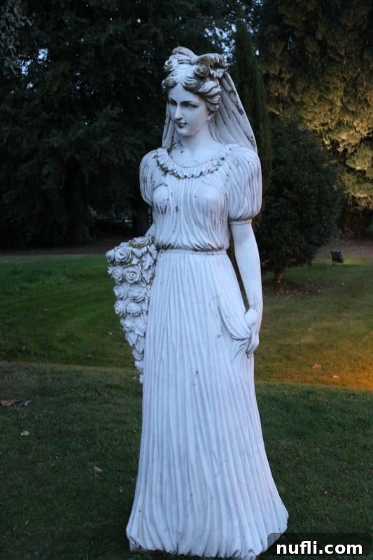 Artistic sculpture of a woman adorned with intricate floral details.