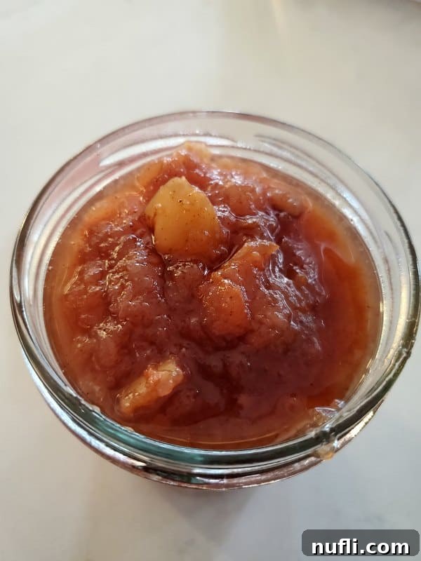 Easy Homemade Slow Cooker Pear Butter 5 Crockpot pear butter in a glass mason jar