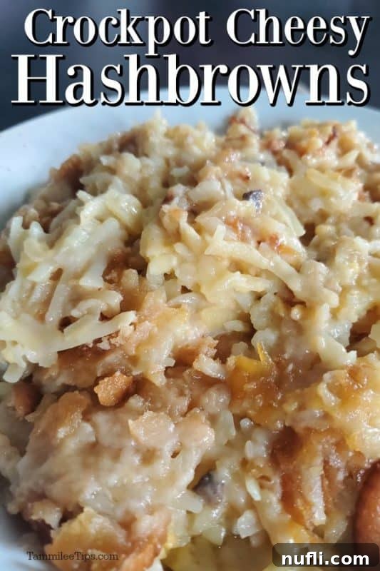 Creamy Slow Cooker Hashbrown Casserole 2 A white bowl brimming with golden, cheesy hashbrowns, with the text 'Crockpot Cheesy Hashbrowns' overlayed.