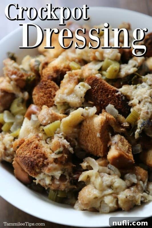 Crockpot Dressing over a white bowl filled with bread and stuffing