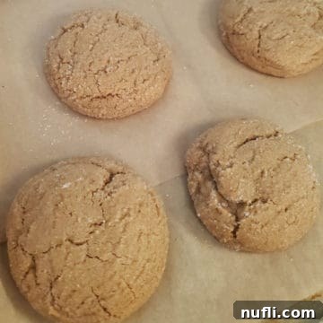 Soft Old Fashioned Molasses Cookies on parchment paper