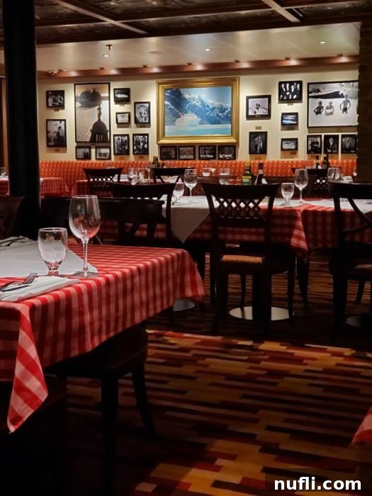 Carnival Cruise Line's Cucina Del Capitano 4 Cucina Del Capitano seating area with classic red checkered tablecloths and framed photos adorning the walls, creating an authentic Italian restaurant atmosphere