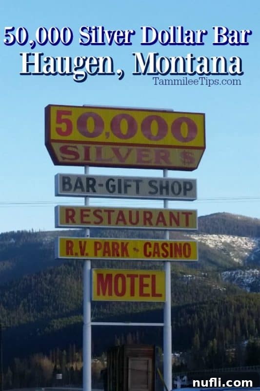 Iconic roadside sign for the 50,000 Silver Dollar Bar in Haugan, Montana