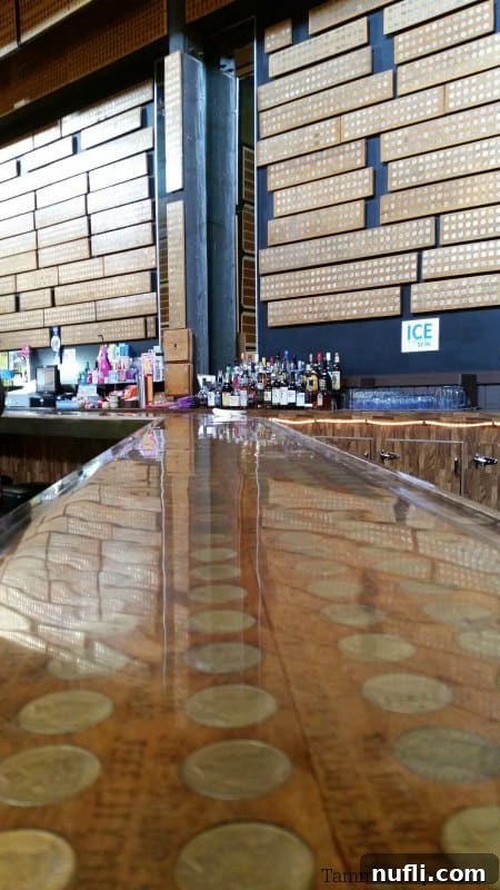 Interior view of the 50,000 Silver Dollar Bar with thousands of silver dollars embedded in the walls and bar top