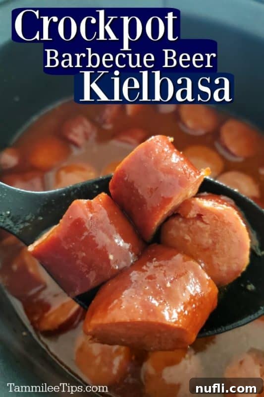 Crockpot barbecue beer kielbasa over a black spoon holding kielbasa over a slow cooker bowl