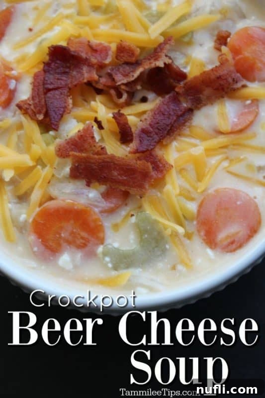 Hearty Crockpot Beer Cheese Soup 2 Crockpot Beer Cheese Soup below a bowl filled with soup