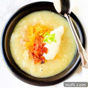 Creamy potato soup with bacon and sour cream