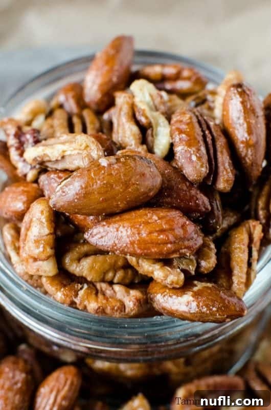 Slow Cooker Sweet and Spicy Nuts 3 sweet and spicy nuts in a glass jar