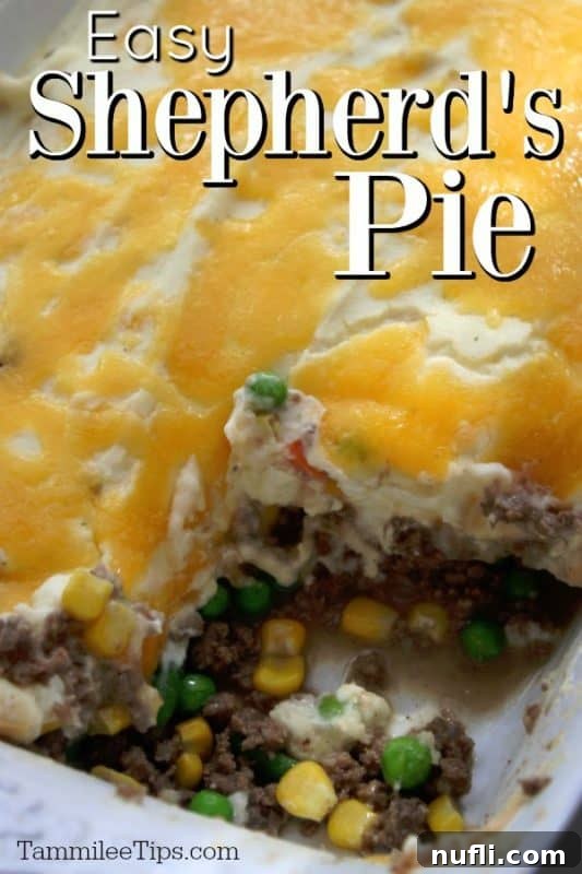 Easy Shepherds Pie with a golden, cheese-covered mashed potato topping in a white baking dish, ready to serve.