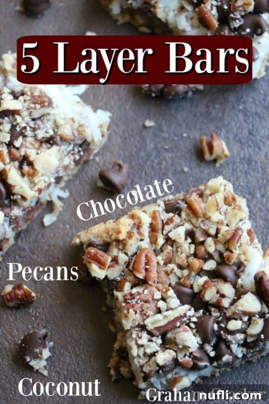 Decadent Five-Layer Chocolate Coconut Bars 2 Delicious 5 layer bars cut into perfect squares, showcasing chocolate, coconut, and pecan layers.