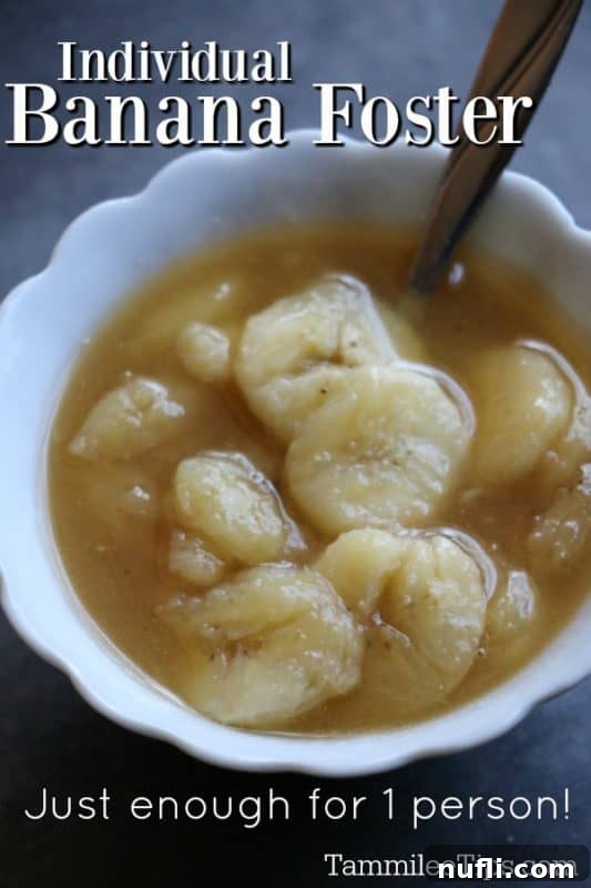 Banana Foster for One 2 Individual banana foster over a bowl with bananas and a spoon
