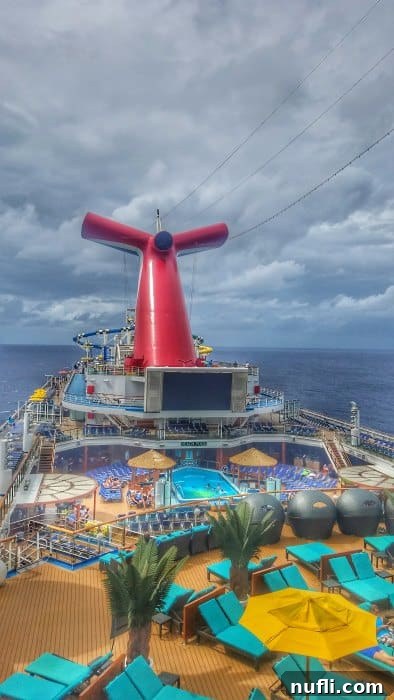 Carnival cruise ship top deck with Carnival Funnel 