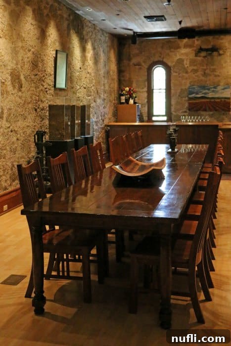 Chateau Montelena: Napa Valley's Legendary Winery 6 Long table for wine tasting with wine glasses in the background