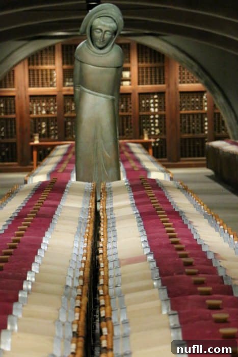 Statue between wine barrels