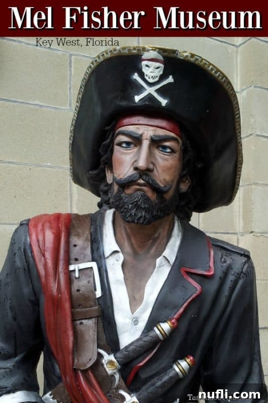 Mel Fisher Museum entrance with pirate statue welcoming visitors