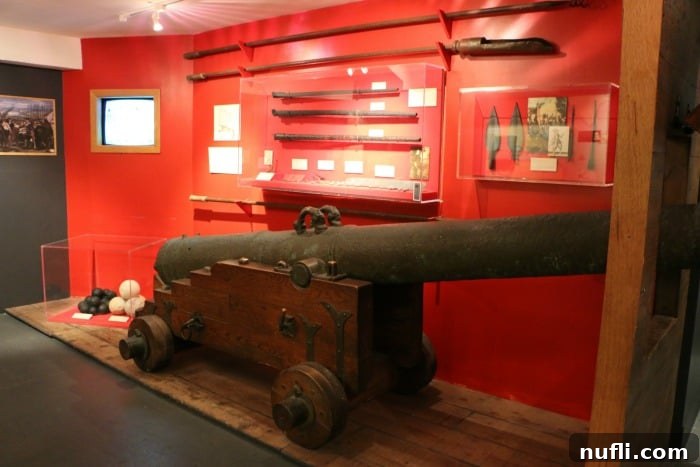 Mel Fisher Maritime Museum display featuring ancient canon and shipwreck artifacts
