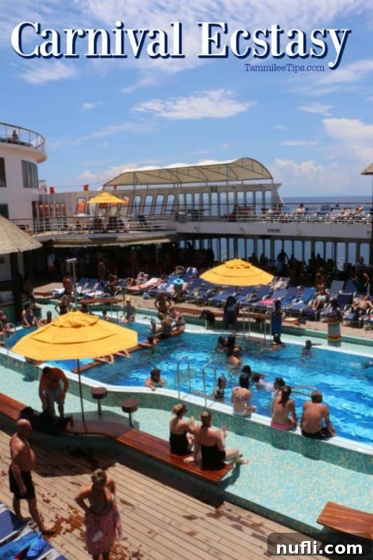 Seven Days of Pure Ecstasy on Carnival 2 Carnival Ecstasy over people in the pool and around the deck