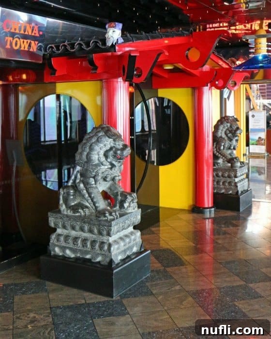 Carnival Ecstasy: Seven Days of Pure Bliss 4 China town entrance with lion statues