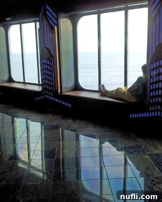 Seven Days of Pure Ecstasy on Carnival 7 Seating along the window with views of the ocean
