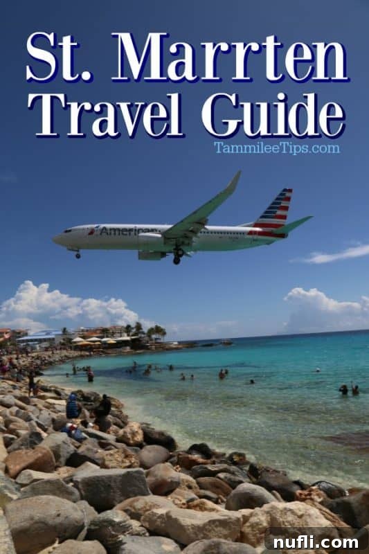 St. Maarten Travel Guide: American Airlines plane flying low over Maho Beach, with people in the water watching