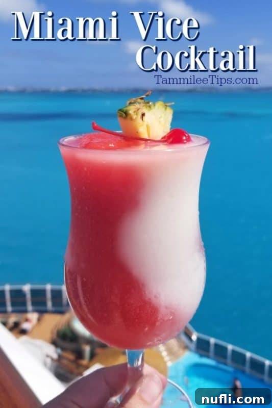 Vibrant Miami Vice Cocktail in a hurricane glass, garnished with a fresh pineapple wedge and a maraschino cherry, set against a bright blue ocean backdrop.