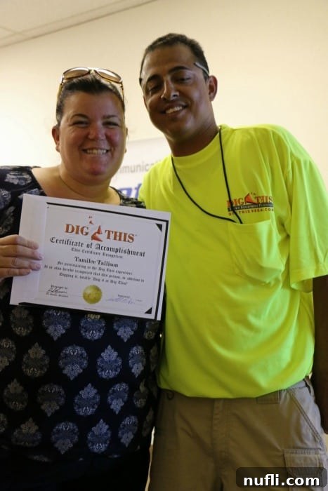 Tammilee with her Dig This certificate of accomplishment