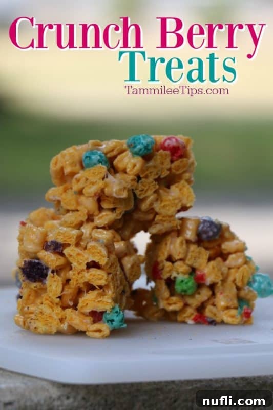 Colorful Crunch Berry Treats stacked high on a white plate, showcasing their vibrant appearance and appealing texture.