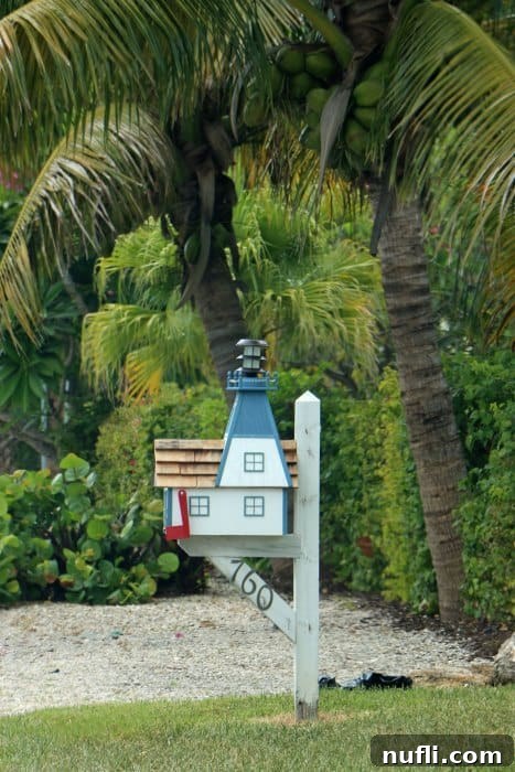 A charming lighthouse-themed mailbox, reflecting the maritime heritage and coastal beauty of Captiva Island.