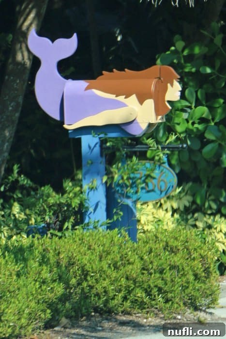 A whimsical mermaid mailbox, enchanting visitors with its creative design and evoking the magical allure of the Sanibel coast.
