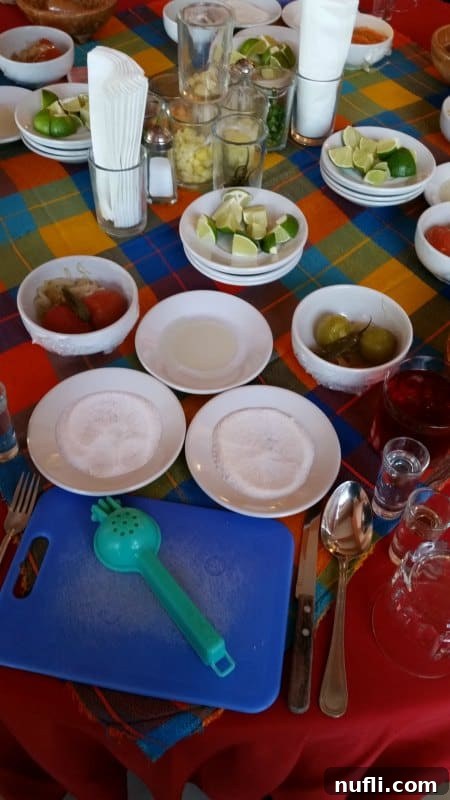 plates with sugar, limes, and more spread over a table 