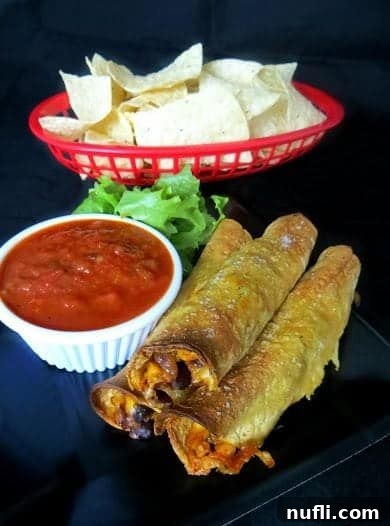 Crispy Corn and Black Bean Baked Taquitos 2 Crispy Corn & Black Bean Baked Taquitos on a serving platter