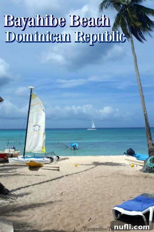 Bayahibe Beach Escape in La Romana, Dominican Republic 2 Panoramic view of Bayahibe Beach in the Dominican Republic, featuring golden sands, swaying palm trees, and inviting lounge chairs under a clear blue sky.